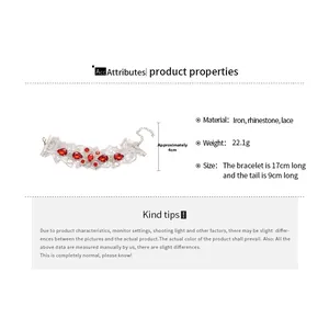 Détails du bracelet en dentelle avec strass rouges, largeur 4cm et poids 22g