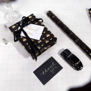 Black and gold crown pattern gift wrapping paper set with ribbon and thank you card