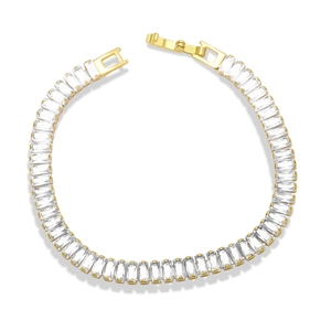 Golden tennis bracelet featuring baguette-cut zircon stones and a secure fold-over clasp