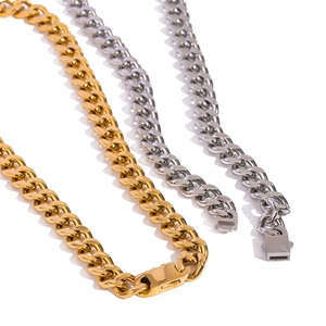 Three gold and silver stainless steel Cuban link chain necklaces on a white background