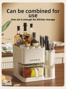 Close-up of cream multifunctional kitchen storage rack with drawers and knife holders