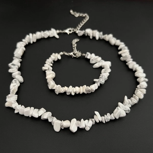 Detail of white turquoise stone necklace and bracelet set with silver lobster clasp