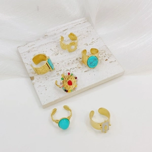 Set of 6 gold adjustable stainless steel rings featuring turquoise and floral crystal beads
