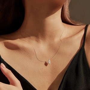 Elegant 1 carat marquise cut moissanite pendant on a clear fishline invisible necklace