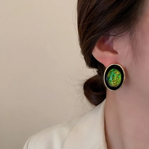 Vintage oval geometric resin earrings with gold metal frame and green foil inlay