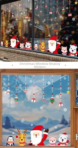 Festive static window decals with Santa, reindeer and penguins on shop and home glass