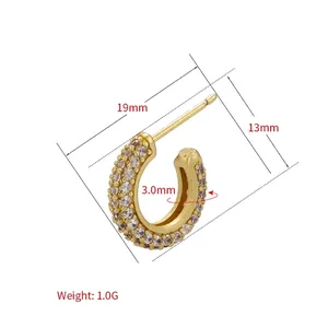 Gold C-shaped stud earrings with micro-paved zircons measuring 19mm in height