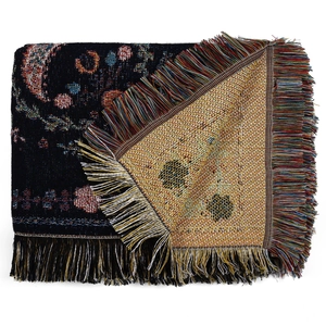 Detail of bohemian jacquard throw blanket showing intricate star pattern and colorful fringes