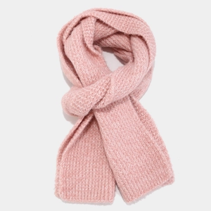 Detail of soft pink thick knit scarf with fuzzy texture for winter warmth