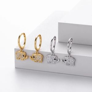 Detailed view of silver and gold elephant hoop earrings with shimmering cubic zirconia