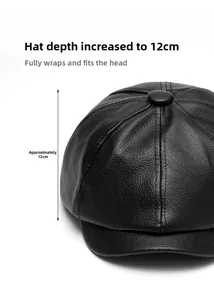 Detail of black leather newsboy cap showing 12cm deep crown and pebble grain texture