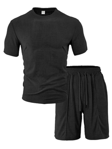 Close-up of black mesh texture on a men's casual short sleeve and shorts sports set
