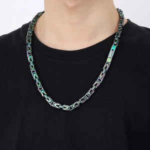 Close-up of rainbow Byzantine stainless steel chain necklace on male model neck