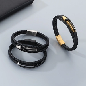 Detail of multi-layer woven leather bracelets for men with magnetic metal clasps