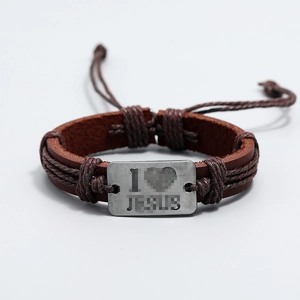 Detail of adjustable woven brown leather bracelet with I Love Jesus metal plaque