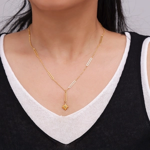 Gold plated North Star pendant necklace with cubic zirconia on a minimalist cable chain