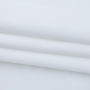 Close-up of white chiffon fabric texture showing the fine grain and elegant soft drape