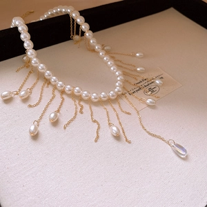 French vintage pearl tassel necklace with gold chains and teardrop crystal pendant