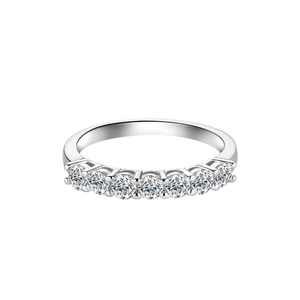 Minimalist 925 sterling silver ring featuring seven round sparkling moissanite stones