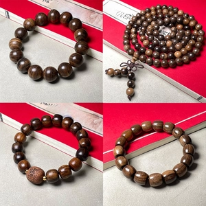 Ensemble de bracelets bouddhistes en bois d'agar 108 perles avec grain naturel sombre