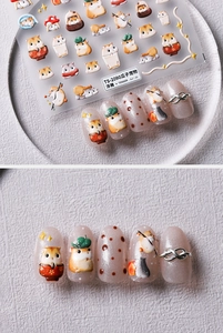 Detailed view of 5D embossed hamster nail art stickers with 3D relief texture on fingertips