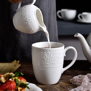 European style white ceramic teapot set with embossed floral patterns for afternoon tea