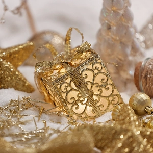 Golden hollow metal gift box with warm LED lighting for Christmas tree top decoration