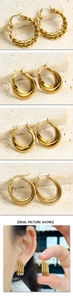 Macro detail of 18k gold plated stainless steel C-shaped earrings with multiple textures