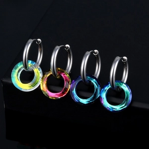 Detailed view of faceted crystal hoop earrings in four colors with steel clasps