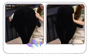 Detail showing the elastic fabric and durability of the large orca whale plush toy