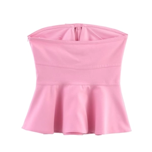 Pink peplum tube top for women featuring a stylish bow detail and elegant flared hemline
