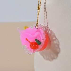 Miniature pink cream sundae dessert keychain with cherry and golden bead chain