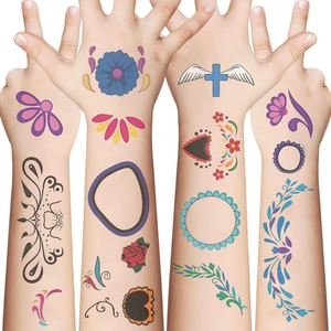 Cartoon Halloween temporary tattoos for kids featuring colorful heart and floral designs