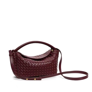 Deep wine red woven mini handbag with arched handle and thin shoulder strap