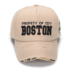 Retro khaki Boston embroidered baseball cap with distressed holes and camo brim detail