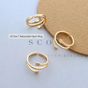 Irregular 18K gold plated titanium steel spiral open ring featuring geometric elements