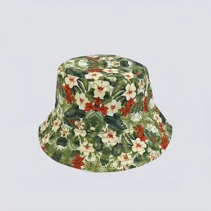 Detail of tropical floral print on a canvas bucket hat with vibrant red and green colors