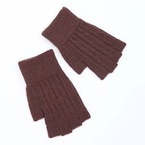 Detailed view of brown cable knit fingerless gloves with ribbed cuffs on white background
