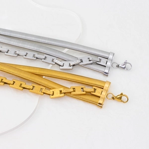 Three-layer titanium steel snake bone chain necklaces in gold and silver finishes