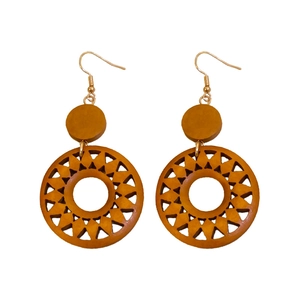 Retro wooden hollow sun earrings with geometric sunburst design on white background