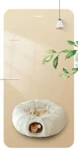 Detail of grey plush tunnel cat bed showing the soft texture and spacious round shape
