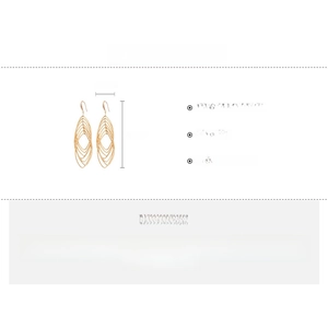 Détails des dimensions et matériaux des boucles d'oreilles ovales dorées en zircone