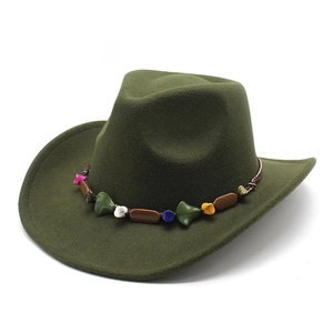 Detail of bohemian colorful beads on dark green wool felt western cowboy hat