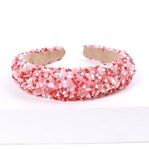 Baroque headband with red and pink beads and shell shards on beige fabric lining