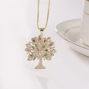 Golden Tree of Life necklace with colorful zircons on a gold box chain in life scene