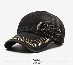 Close-up of 'Classic' embroidery and khaki sawtooth stitching on washed denim cap
