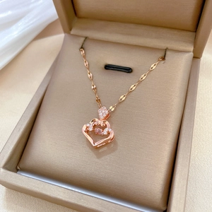 Luxurious rose gold necklace with a sparkling pink heart-shaped crystal pendant