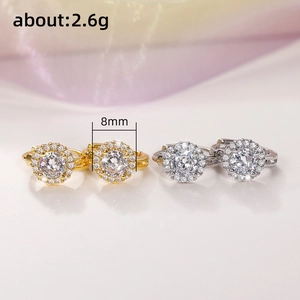 Pair of gold and silver micro-pave zircon hoop earrings with large center stones
