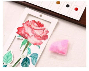 Detail of rose hollow coloring bookmark with pink pigment powder and color guide chart