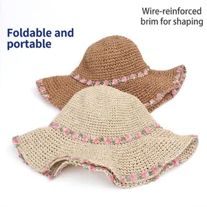 Foldable straw sun hats with floral embroidery in beige and coffee for beach vacations